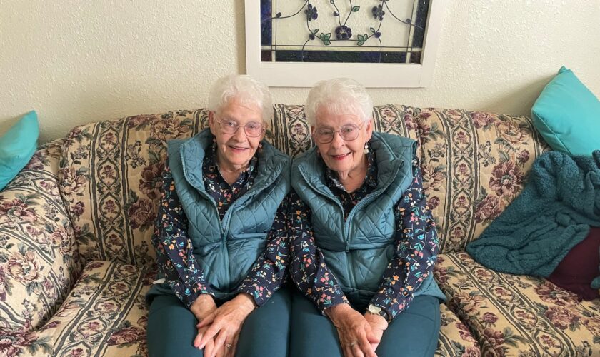 Identical twins turn 90, still dress alike and sleep in the same bed