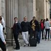 Keen collectors arrive early at the Bank of England to get their hands on the first King Charles III banknotes