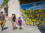 Now Barcelona joins Spain's war on tourists: Mayor pledges to drive AirBnb out of the city within five years after rents spiralled for locals