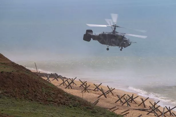 Putin's humiliation as Russian air defences shoot down his own military helicopter
