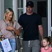 Rory McIlroy puts his wedding ring back on as he and wife Erica Stoll play happy families after shock divorce U-turn and golf star's US Open meltdown on day out with daughter Poppy