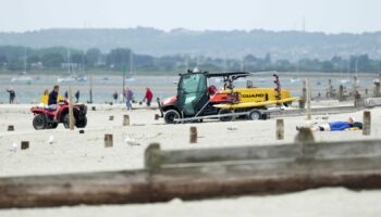 Police have launched an investigation after a teenage boy drowned on a school trip to a seaside beauty spot..The boy from a school in London was airlifted off the beach at West Wittering on Tuesday afternoon..He was confirmed dead at hospital..The boy was part of a group from Uxbridge College who had visited the area for a school trip. Pic: Eddie Mitchell