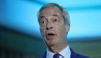 Hecklers interrupt Nigel Farage as he gives first speech since historic election