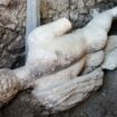 Statue of Greek god uncovered by archaeologists during excavation of ancient Roman sewer in Bulgaria