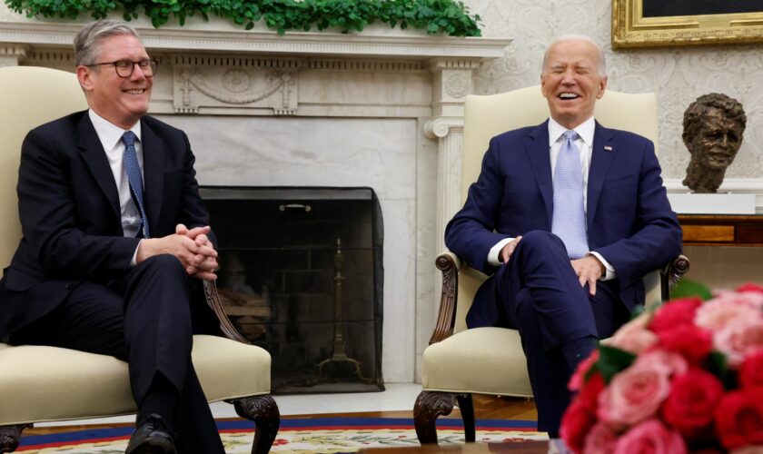 U.S. President Joe Biden reacts as he hosts a bilateral meeting with Britain's new Prime Minister Keir Starmer, on the sidelines of NATO's 75th anniversary summit, in the Oval Office at the White House in Washington, U.S. July 10, 2024. REUTERS/Evelyn Hockstein