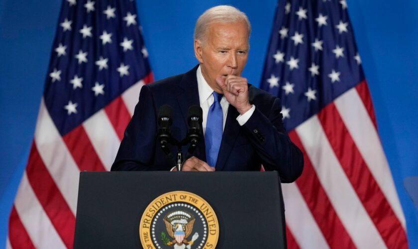 President Joe Biden had to clear his throat a number of times during the news conference. Pic: AP Photo/Matt Rourke