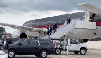 Republican presidential candidate and former U.S. President Donald Trump gestures as he arrives at Milwaukee Mitchell International Airport a day after he survived an assassination attempt at a rally in Butler, Pennsylvania, in Milwaukee, Wisconsin, U.S., July 14, 2024 in this screengrab obtained from a social media video. Dan Scavino Jr. via X/via REUTERS THIS IMAGE HAS BEEN SUPPLIED BY A THIRD PARTY. MANDATORY CREDIT. NO RESALES. NO ARCHIVES.