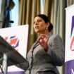 Priti Patel speaks on stage at the Britain's Conservative Party's annual conference in Manchester