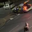 Police launch criminal investigation after officer was filmed running over cow