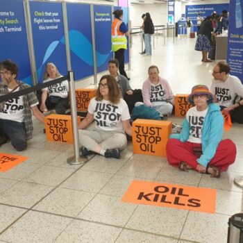 Just Stop Oil activists arrested at airport after departure gate protest