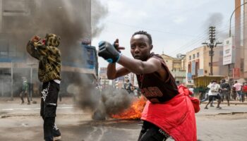 After weeks of protests, Kenya’s president sacks his much reviled ministers