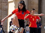 And the fans can play a bit too! England supporter wows the Berlin crowd with her skills as crowds gather ahead of tomorrow night's final against Spain