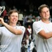 Harri Heliovaara and Henry Patten hold their Wimbledon doubles trophies