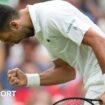 Novak Djokovic bends over, clenches his fist and roars in celebration during his Wimbledon first-round match against Vit Kopriva