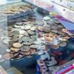 Do you squirrel them away or just throw them on the floor? Brits reveal what they REALLY do with their 1p and 2p coins