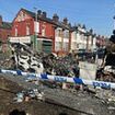 Leeds in rubble: Clear-up begins after night of shame which saw a patrol car tipped over and a bus torched - as questions grow over how the city was left to burn for hours after riot police were driven out by thugs