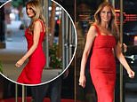 Melania Trump stuns in $4,000 dress and red stilettos in rare appearance as she raises $1.4million at lavish Manhattan fundraiser... while husband Donald lays low after the debate