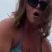 Moment bellowing Karen tries to rope off areas of public BEACH outside her stunning California home while hurling abuse at shocked family