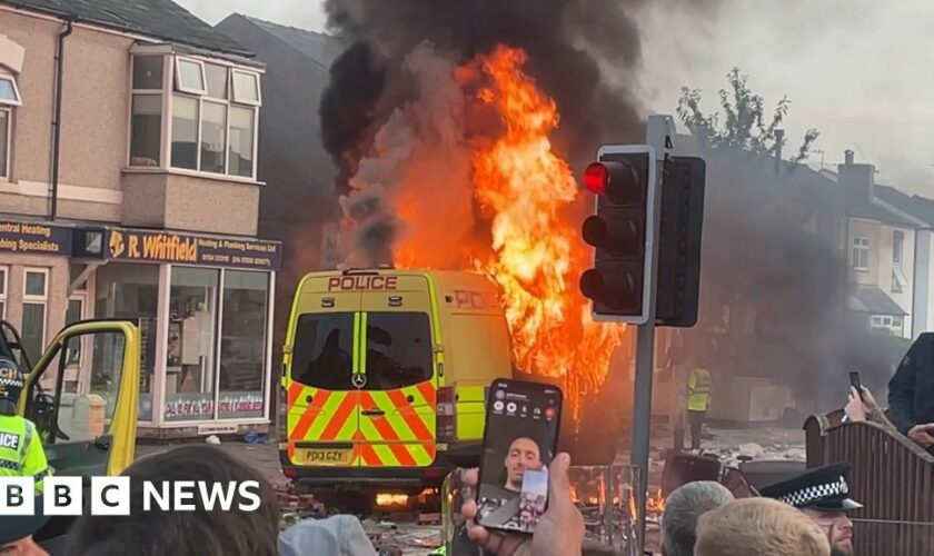 Police van set alight as protest breaks out in Southport