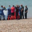 Seaford beach chaos as man's body found with black tarpaulin sheets across sand