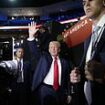 Trump's human shield: Ex-President enters RNC with beefed-up 15-strong troupe of Secret Service bodyguards after attempt on his life just two days earlier