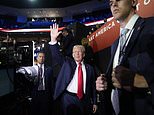 Trump's human shield: Ex-President enters RNC with beefed-up 15-strong troupe of Secret Service bodyguards after attempt on his life just two days earlier