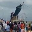 Venezuelan activists topple Hugo Chavez statue amid violence over the country's disputed presidential election