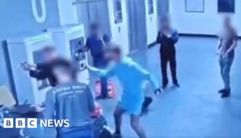 Video shows lead-up to police airport kick incident