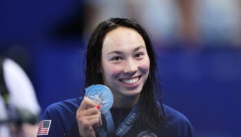 Swimmer Torri Huske uses downtime in Olympic Village to make friendship bracelets for Taylor Swift show