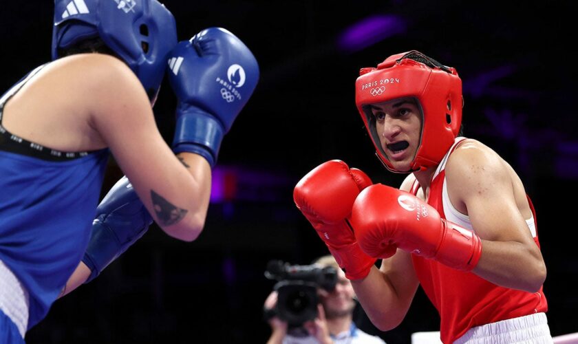 Olympic boxer who failed gender test wins quarterfinal bout, guaranteed medal
