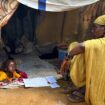 A displaced Sudanese woman rests inside a shelter at Zamzam camp, in North Darfur, Sudan, August 1, 2024. REUTERS/Mohamed Jamal Jebrel