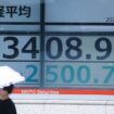 A monitor shows Japan's Nikkei Stock Average temporarily plunging more than 2,500 yen in Tokyo on Monday, August 5, 2024. ( The Yomiuri Shimbun via AP Images )