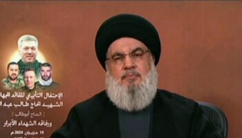 Hassan Nasrallah, le chef du mouvement islamiste libanais Hezbollah, parle lors d'un discours télévisé au Liban, le 19 juin 2024