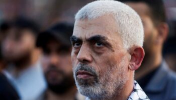 Hamas leader Yehya Al-Sinwar looks on as Hamas supporters take part in an anti-Israel rally over tension in Jerusalem's Al-Aqsa mosque, in Gaza City October 1, 2022. REUTERS/Mohammed Salem/