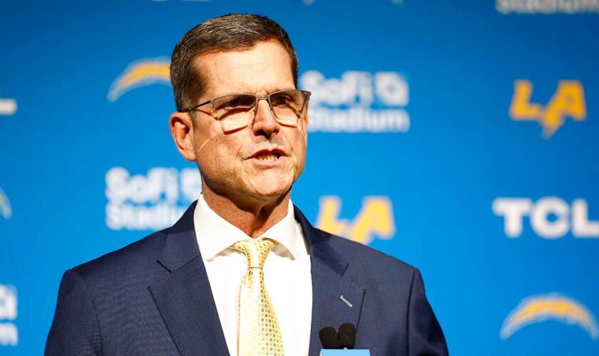 Chargers coach Jim Harbaugh to serve as honorary captain at Michigan's season opener despite NCAA penalties