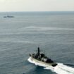 HMS Richmond (foreground) moves at speed to make contact with the Chinese destroyer Jiaozuo. Pic: Royal Navy