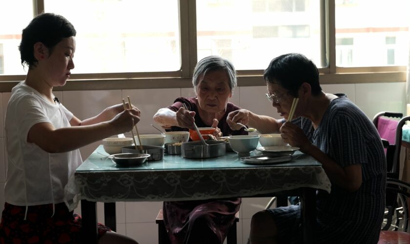 Three generations of the family - (L-R) Sara Huang, Grandmother Jin Lianrong, and mother Jiang Jinzhu