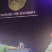 Liz Truss storms off stage after lettuce banner prank