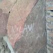 British tourist scrawls his and his two daughters' initials on wall of Pompeii's world heritage site House of the Vestal Virgins fresco - and is ordered to pay for restoration work