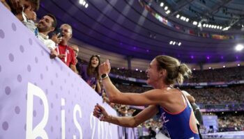 Divided fans react to Olympian's 'brave' move to propose to boyfriend at finish line