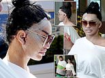 Katie Price has a bloodied and bruised face wrapped in bandages as she is seen for the first time since undergoing her SIXTH face lift in Turkey