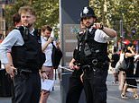 Schoolgirl, 11, and woman, 34, stabbed in London's busy Leicester Square and rushed to hospital as police arrest man