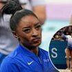 Simone Biles appears to HIT OUT at Olympics crowd after falling off beam - as teammate Suni Lee blames 'tense' atmosphere in Paris