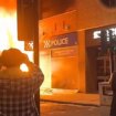 Sunderland police station set on fire as rioters hurl beer barrels at police