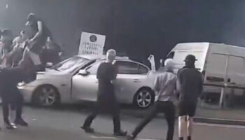 UK riots: Sickening moment racist mob in Hull drag man out of car shouting 'kill them'