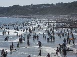 Warmest day of the year expected today with temperatures to top 35C as the UK's blisteringly hot summer continues - as the Met Office issues thunderstorm warning for large parts of Britain in the heat