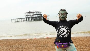 EDITORIAL USE ONLY People take part in a protest by Surfers Against Sewage (SAS), in Brighton, who are calling for an end to the sewage discharges plaguing the UK's rivers and seas. Picture date: Saturday May 18, 2024.