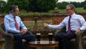 Prime Minister Sir Keir Starmer (right) and Taoiseach Simon Harris drink a pint of Guinness during his visit to Chequers, the country house of the serving Prime Minister of the United Kingdom, near Aylesbury, Buckinghamshire. Picture date: Wednesday July 17, 2024. PA Photo. See PA story POLITICS Ireland. Photo credit should read: Carl Court/PA Wire.