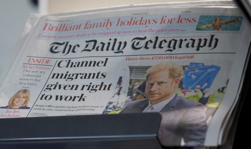 Copies of The Daily Telegraph displayed in a supermarket in London, 20 January 2024. Pic: REUTERS/Belinda Jiao