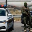 An Israeli soldier stands guard at the crossing after the shooting. Pic: Reuters